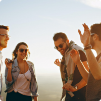 Four young adults dancing